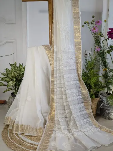 PAKEEZAH  Mul Cotton Chikankari Saree embellished with pearl,cuttdana and zari 