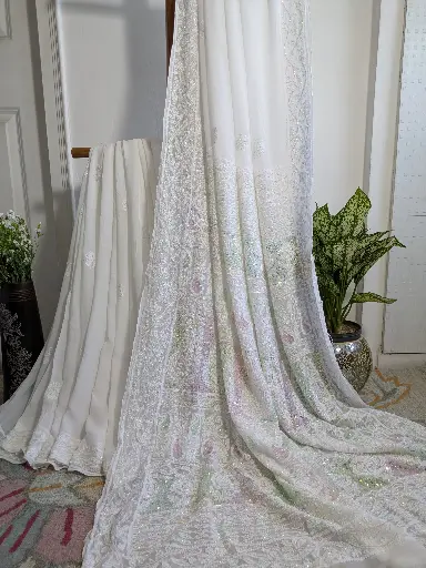 CHANDRIKA  Viscose Chikankari Saree embellished with Cuttdana, Pearl 